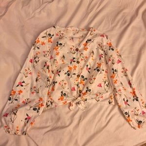 A blouse with light flower design.